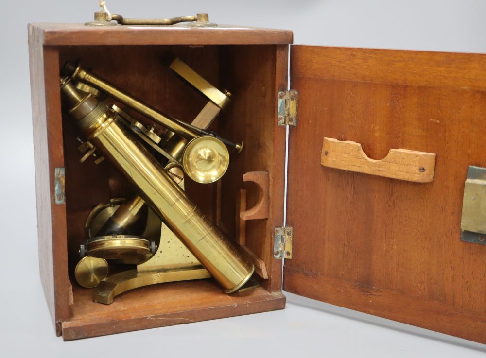 A mahogany cased brass microscope